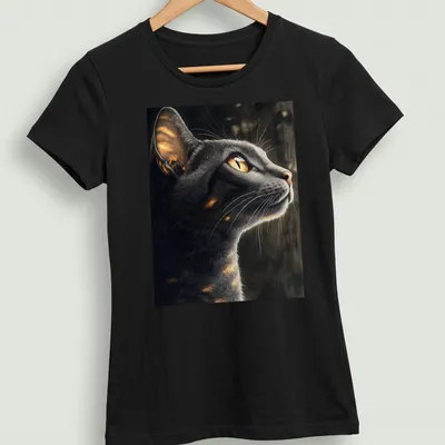 Realistic print of an Abyssinian cat with golden eyes in moonlight — printed on a women's shirt