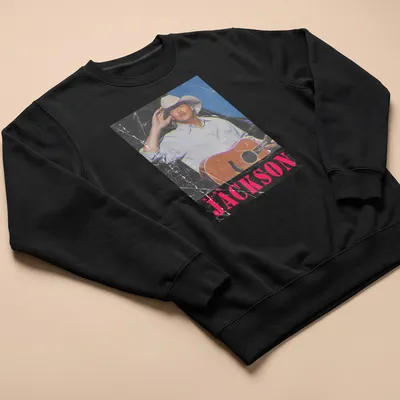 Vintage distressed Alan Jackson t-shirt featuring a guitar illustration — printed on a unisex sweatshirt