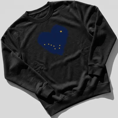 Distressed print of Alaska flag in heart shape, navy blue and yellow — printed on a unisex sweatshirt