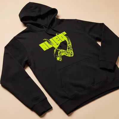 Bold graphic ALIEN³ t-shirt featuring an alien creature in neon yellow and black. — printed on a unisex hoodie