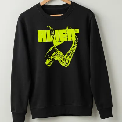 Bold graphic ALIEN³ t-shirt featuring an alien creature in neon yellow and black. — printed on a unisex sweatshirt