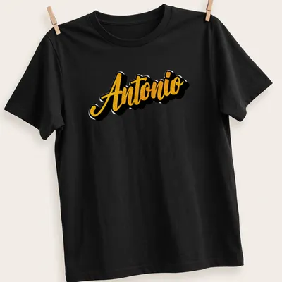 Bold script t-shirt featuring the name Antonio in gold on black. — printed on a unisex t-shirt
