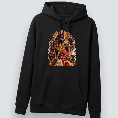 Intricate illustration of Anubis weighing a heart on sacred scales in gold, black, and red — printed on a unisex hoodie