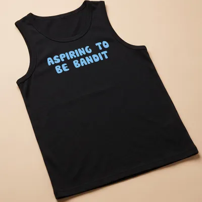 Playful bubble letters spelling ASPIRING TO BE BANDIT on light blue background — printed on a tank top