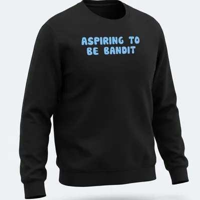 Playful bubble letters spelling ASPIRING TO BE BANDIT on light blue background — printed on a unisex sweatshirt