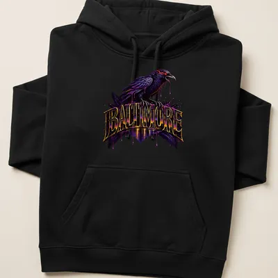 Vibrant graphic tee featuring a raven and 'BALTIMORE' in bold lettering. — printed on a unisex hoodie