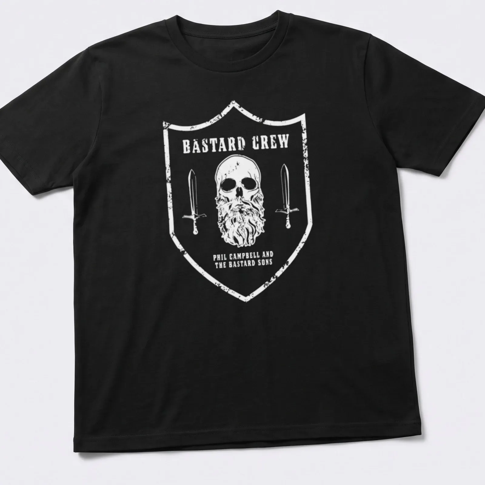 T-shirt featuring a skull with a beard and swords, with vintage distressed text. — printed on a unisex t-shirt