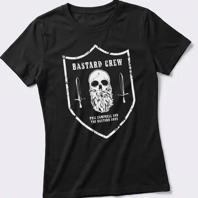 T-shirt featuring a skull with a beard and swords, with vintage distressed text. — printed on a women's shirt