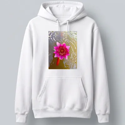 Natural photography of a pink water lily in a tranquil pond setting — printed on a unisex hoodie