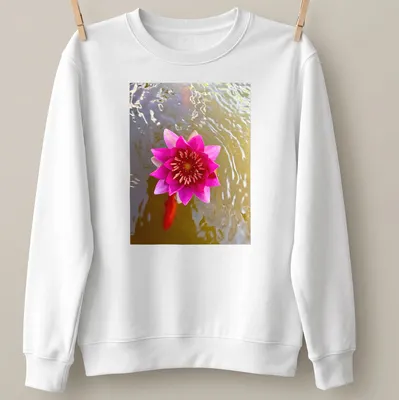 Natural photography of a pink water lily in a tranquil pond setting — printed on a unisex sweatshirt
