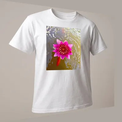 Natural photography of a pink water lily in a tranquil pond setting — printed on a unisex t-shirt (angled view)
