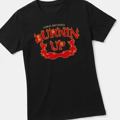 Vintage design featuring flames and Jonas Brothers Burnin Up text — printed on a women's shirt