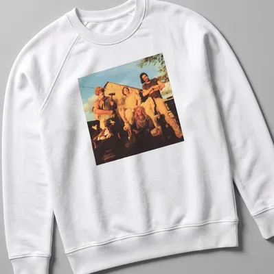 Vintage horror scene t-shirt featuring characters from a horror movie with text But The Saw — printed on a unisex sweatshirt