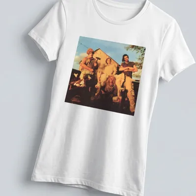 Vintage horror scene t-shirt featuring characters from a horror movie with text But The Saw — printed on a women's shirt
