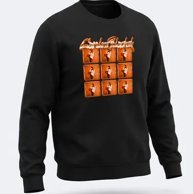 Vibrant T-shirt featuring Caroline Polachek's name with an orange geometric pattern. — printed on a unisex sweatshirt