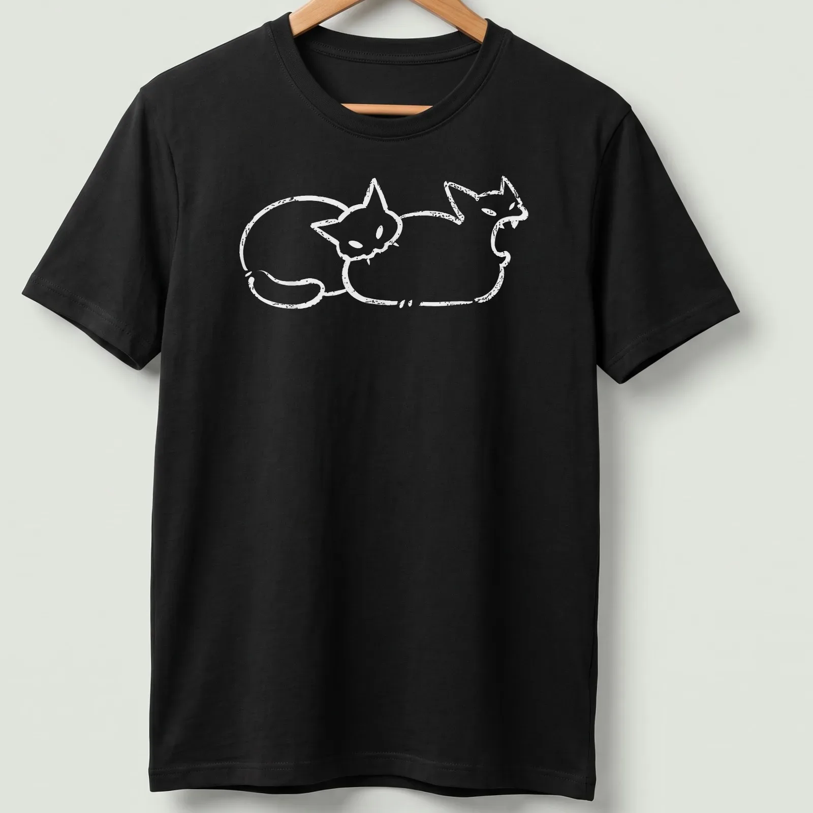 Simple line-art of a cat humorously biting a butt in white — printed on a unisex t-shirt