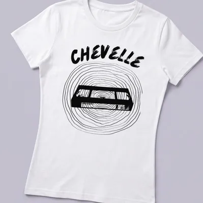 Minimal line-art design of a vintage cassette tape with Chevelle text — printed on a women's shirt
