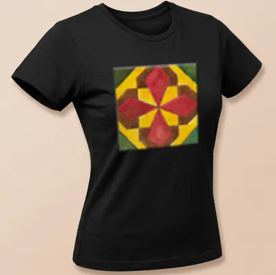 Geometric tile pattern in red, yellow, brown, and green on a tee. — printed on a women's shirt