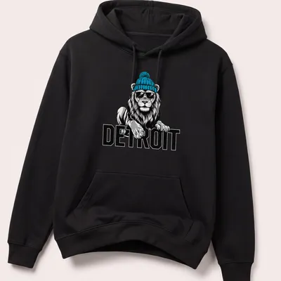 Illustration of a lion in a beanie and sunglasses with Detroit text beneath — printed on a unisex hoodie