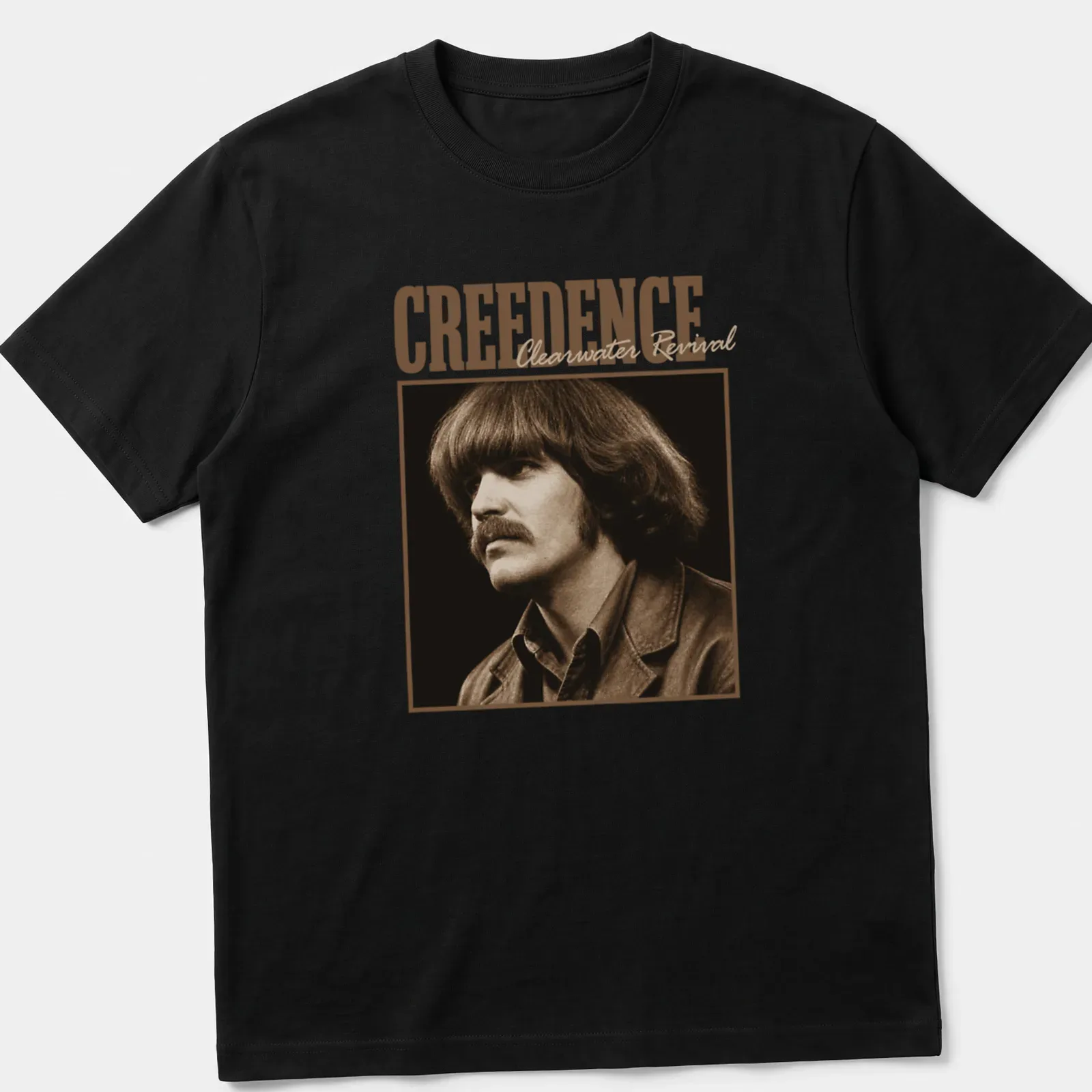 Vintage style t-shirt featuring the text 'CREEDENCE Clearwater Revival' in brown and beige — printed on a unisex t-shirt