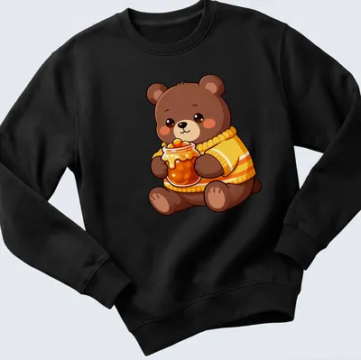 Kawaii style bear cub holding a jar of candy corn in brown and orange — printed on a unisex sweatshirt