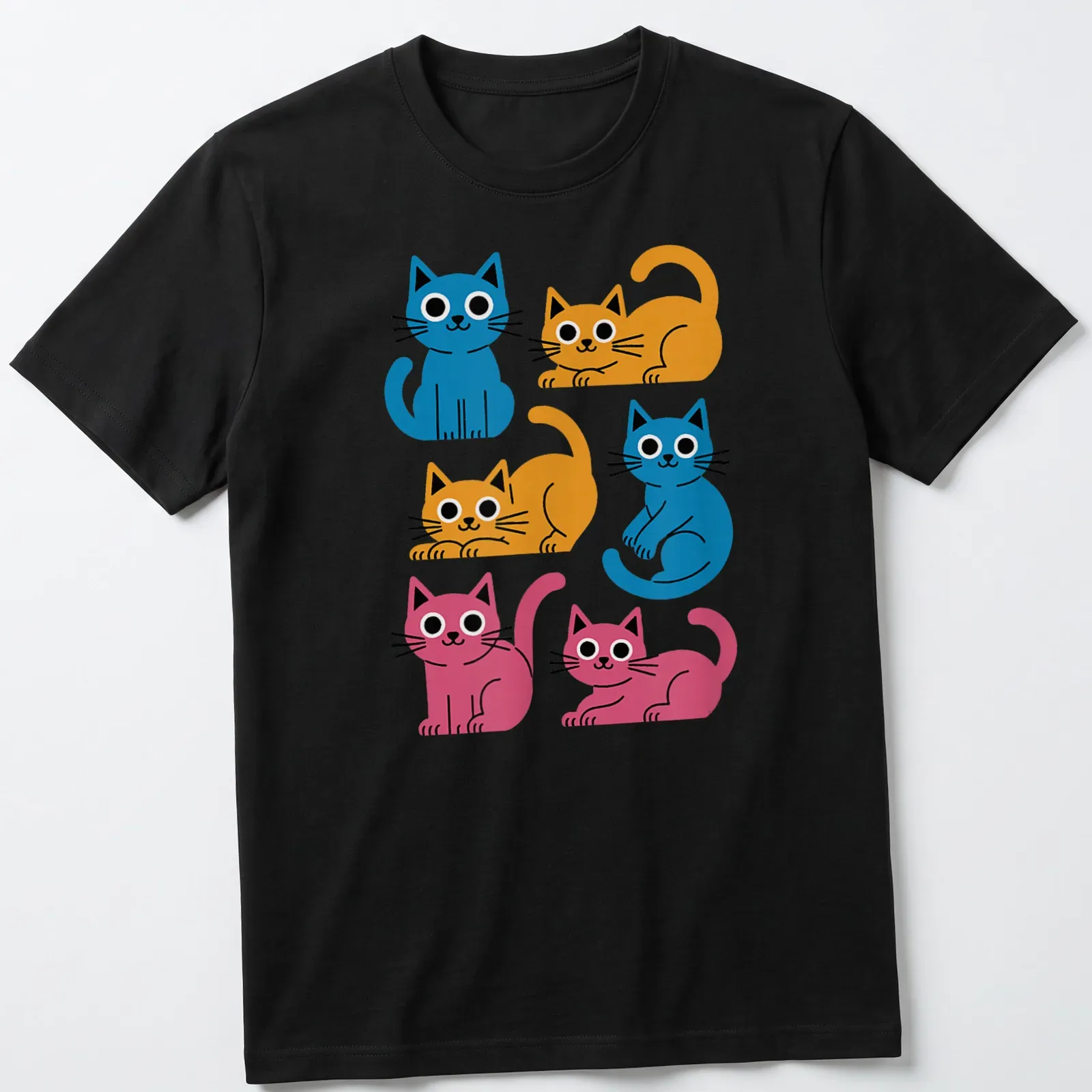 Kawaii-style shirt featuring colorful cartoon cats in blue, orange, and pink — printed on a unisex t-shirt