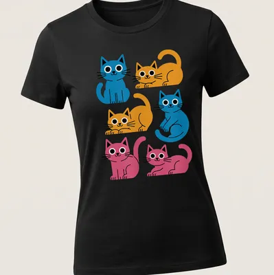 Kawaii-style shirt featuring colorful cartoon cats in blue, orange, and pink — printed on a women's shirt