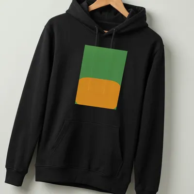 Minimalist t-shirt with abstract shapes and the text 'DerrišRe Le Miroir' in green and orange. — printed on a unisex hoodie