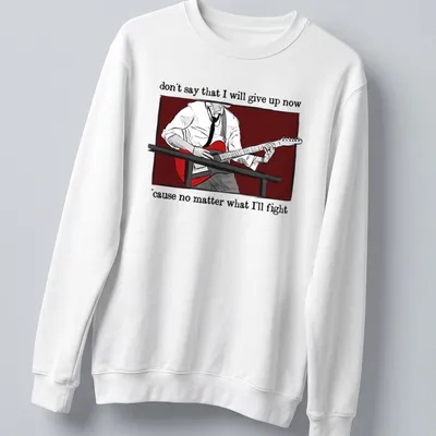 Illustrative design featuring a person playing guitar with inspirational text — printed on a unisex sweatshirt