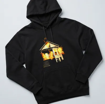 Illustrative design of a house on fire in orange, yellow, and black — printed on a unisex hoodie