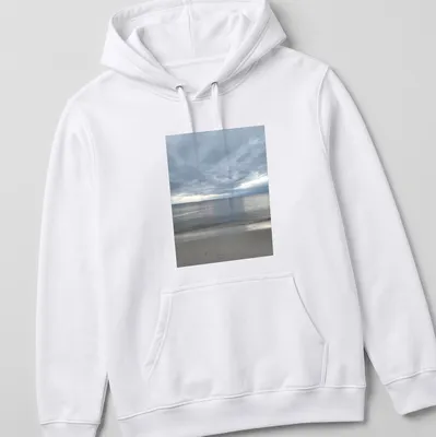Photographic print of a dramatic bay view in gray, blue, and beige hues — printed on a unisex hoodie