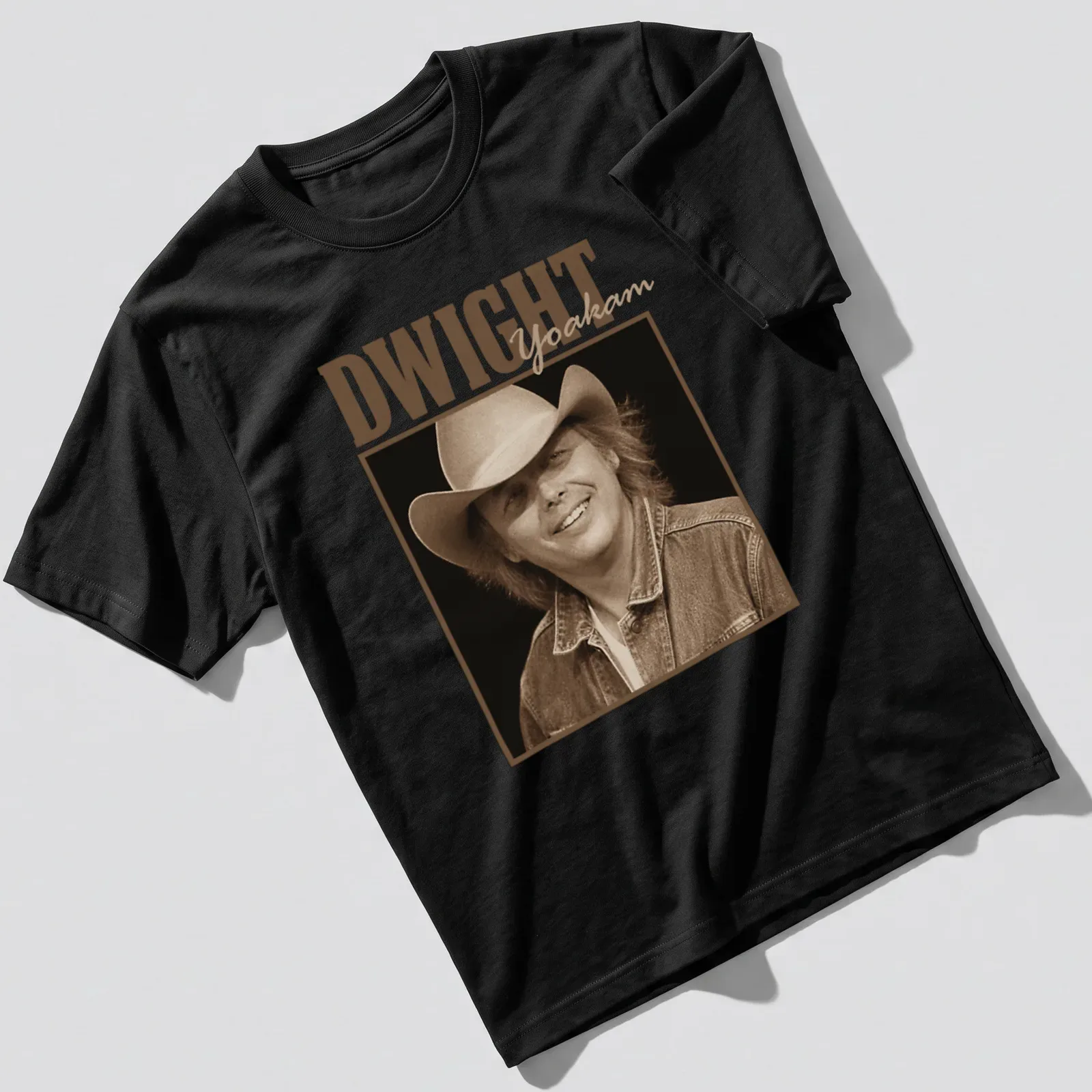 Vintage sepia design featuring Dwight Yoakam text on a musical-themed — printed on a unisex t-shirt