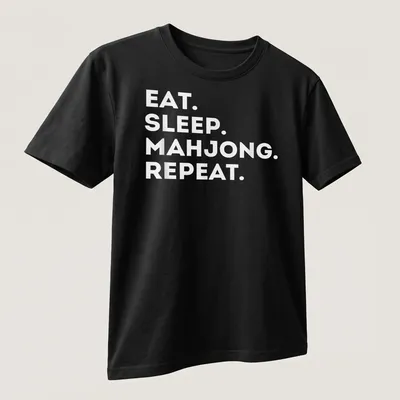 Bold typography shirt with 'EAT. SLEEP. MAHJONG. REPEAT.' text in white — printed on a unisex t-shirt (angled view)