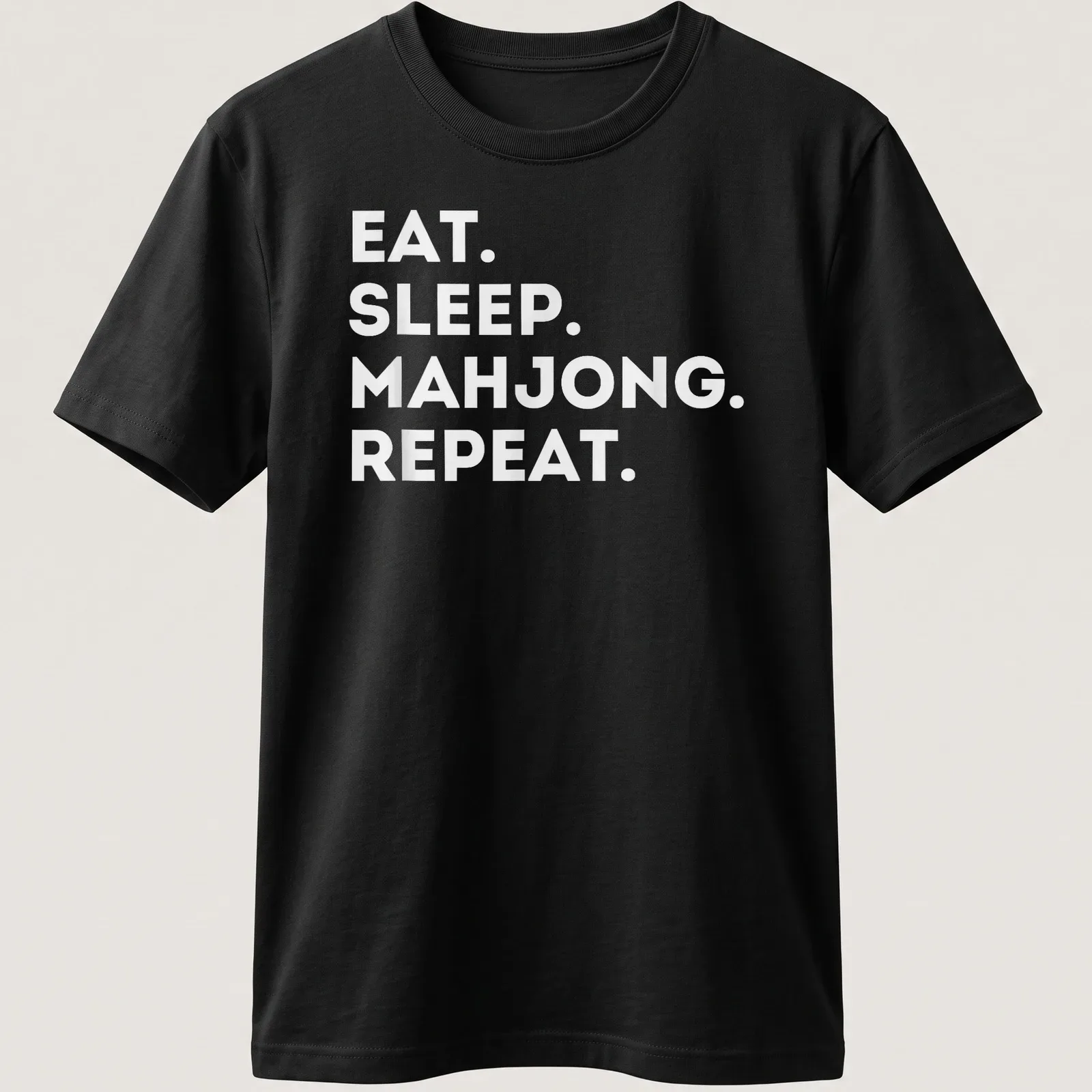 Bold typography shirt with 'EAT. SLEEP. MAHJONG. REPEAT.' text in white — printed on a unisex t-shirt