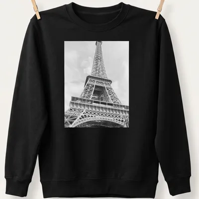 Black and white photograph of the Eiffel Tower on a — printed on a unisex sweatshirt