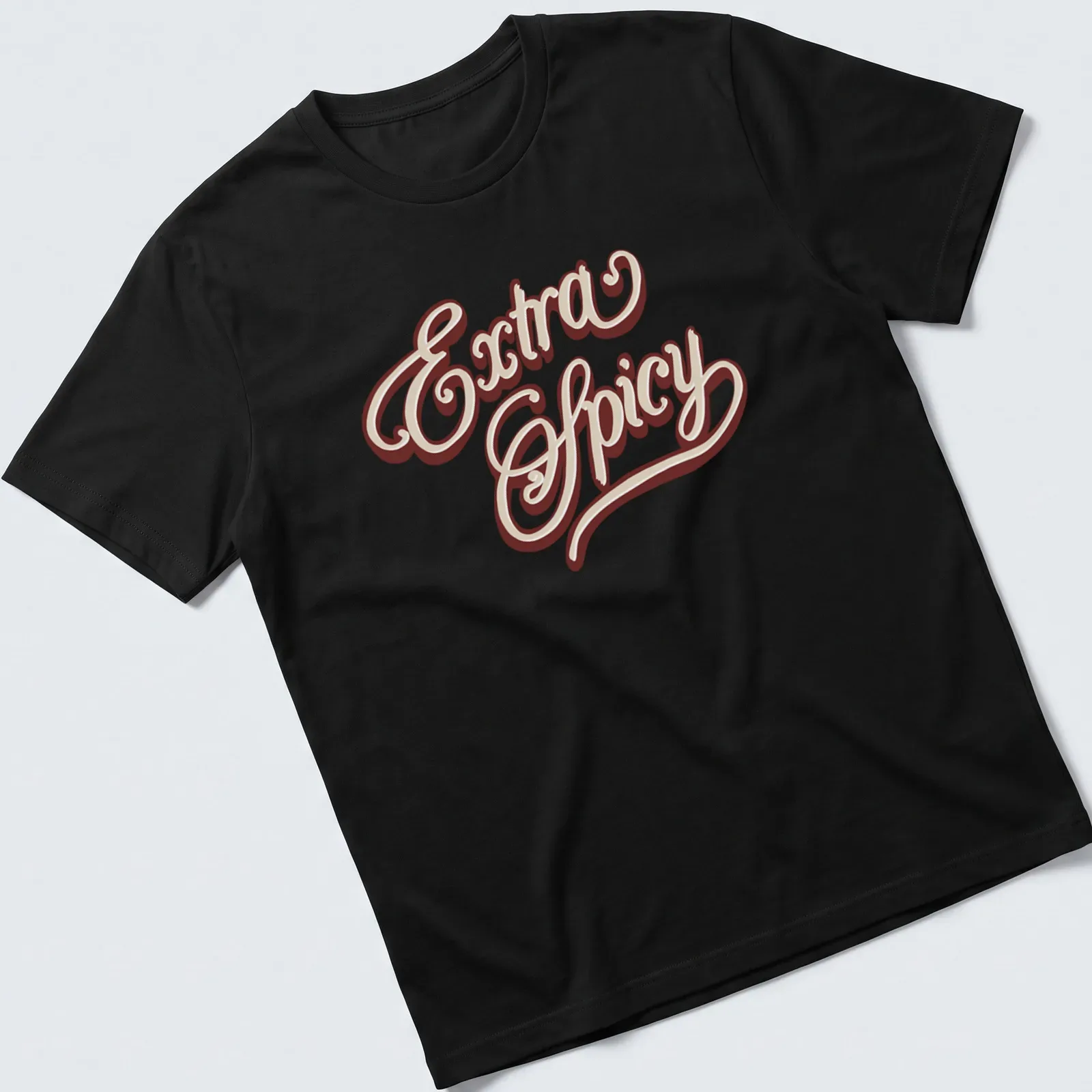 Stylized script Extra Spicy t-shirt in brown and cream colors — printed on a unisex t-shirt