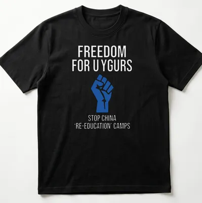 Bold graphic T-shirt with text calling for Uyghur freedom and a raised fist