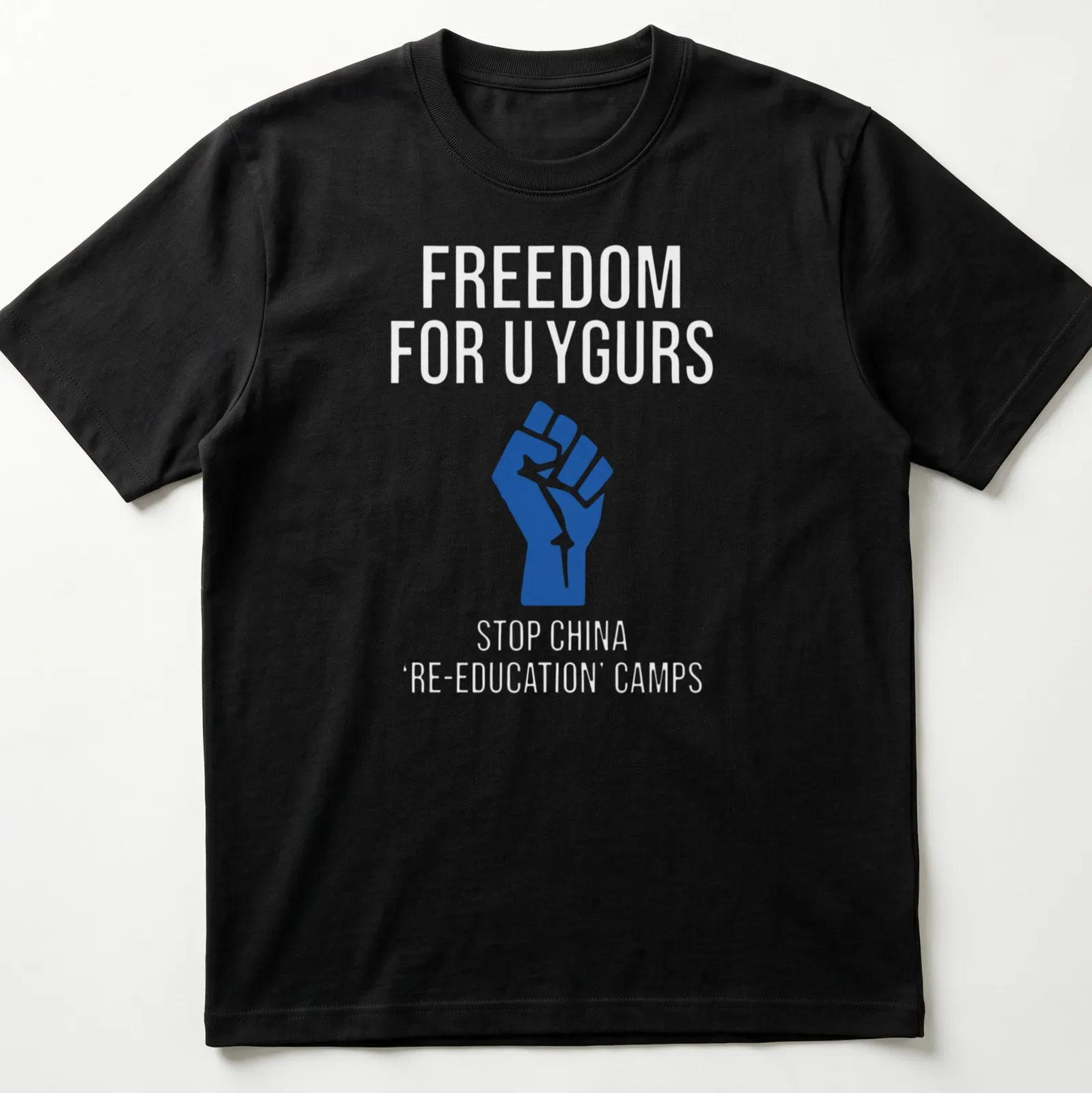 Bold graphic T-shirt with text calling for Uyghur freedom and a raised fist — printed on a unisex t-shirt