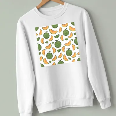 Seamless pattern of cantaloupe melons with green leaves on white background. — printed on a unisex sweatshirt