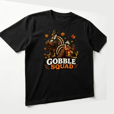 Vintage cartoon t-shirt featuring funny turkeys with the words Gobble Squad — printed on a unisex t-shirt (angled view)