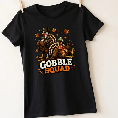 Vintage cartoon t-shirt featuring funny turkeys with the words Gobble Squad — printed on a women's shirt