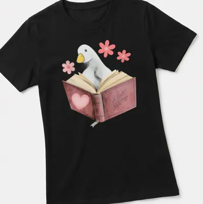 Kawaii illustration of a goose reading a book with colorful flowers — printed on a women's shirt