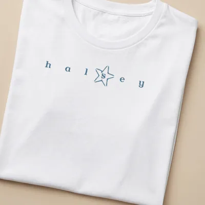 Minimalist Halsey star logo t-shirt with blue and white typography — printed on a women's shirt