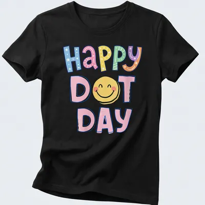 Colorful illustration of a smiley face with the words Happy Dot Day — printed on a women's shirt