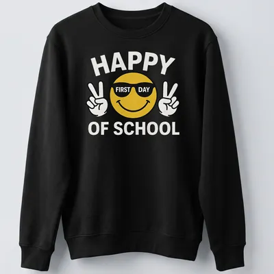 Playful cartoon smiley face with the text 'Happy First Day Of School' in yellow and black — printed on a unisex sweatshirt
