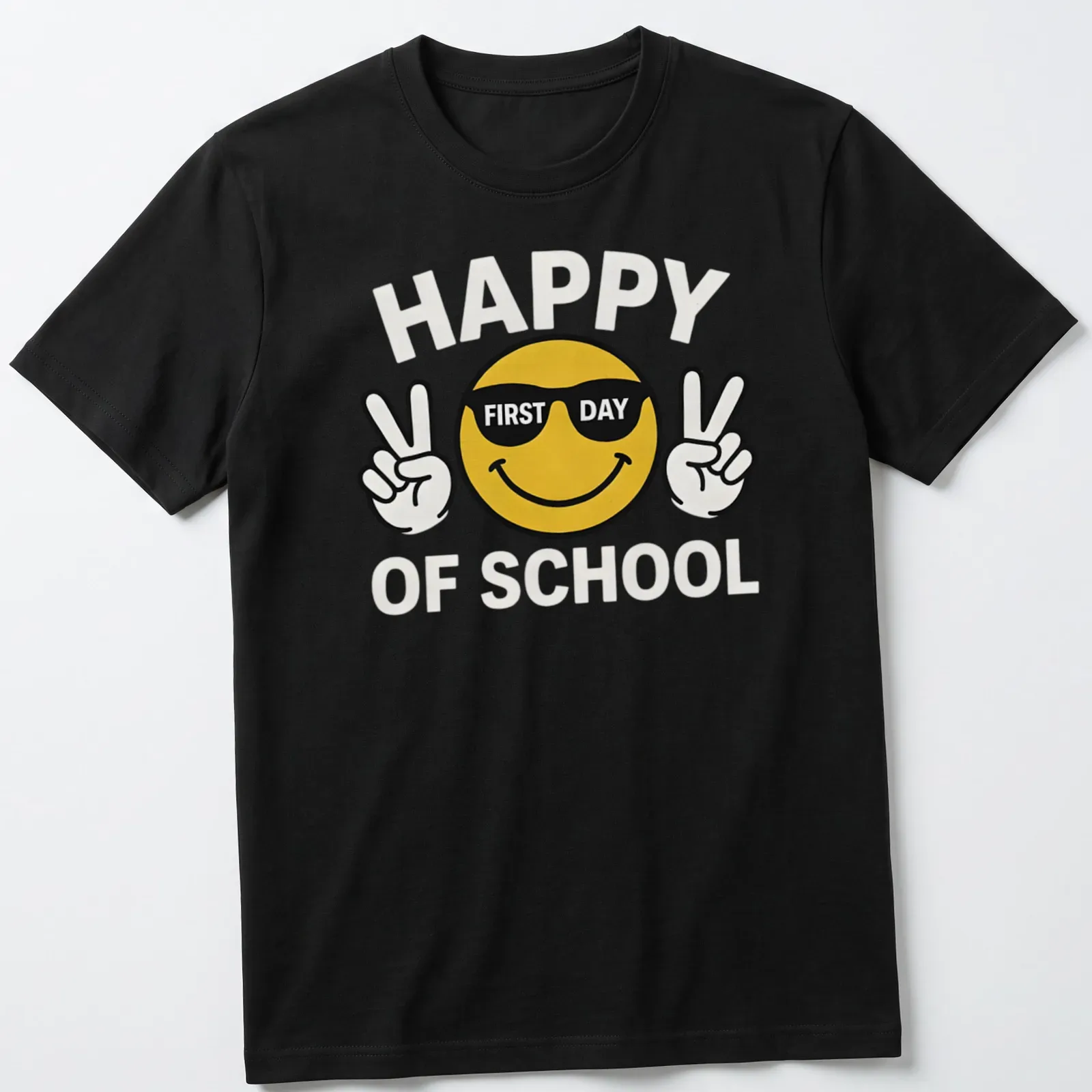 Playful cartoon smiley face with the text 'Happy First Day Of School' in yellow and black — printed on a unisex t-shirt