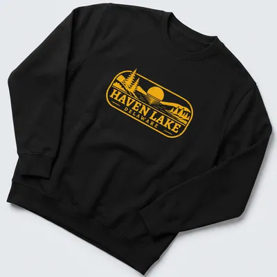 Vintage scene of a lake at sunset with trees, printed in yellow and black — printed on a unisex sweatshirt