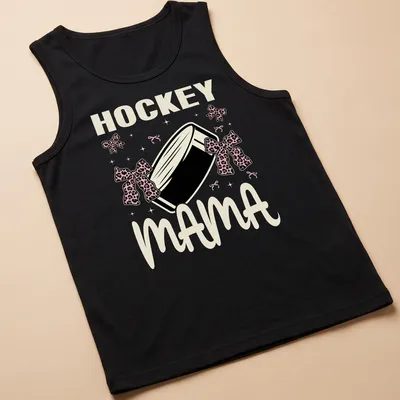 Hockey Mama t-shirt with leopard print bows around a hockey puck — printed on a tank top