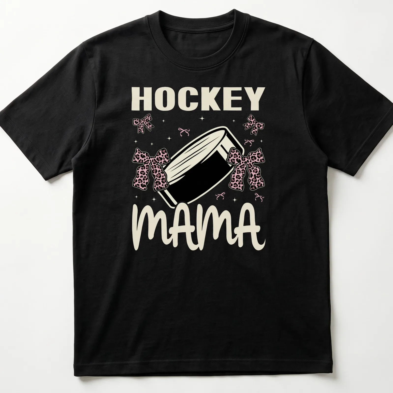 Hockey Mama t-shirt with leopard print bows around a hockey puck — printed on a unisex t-shirt