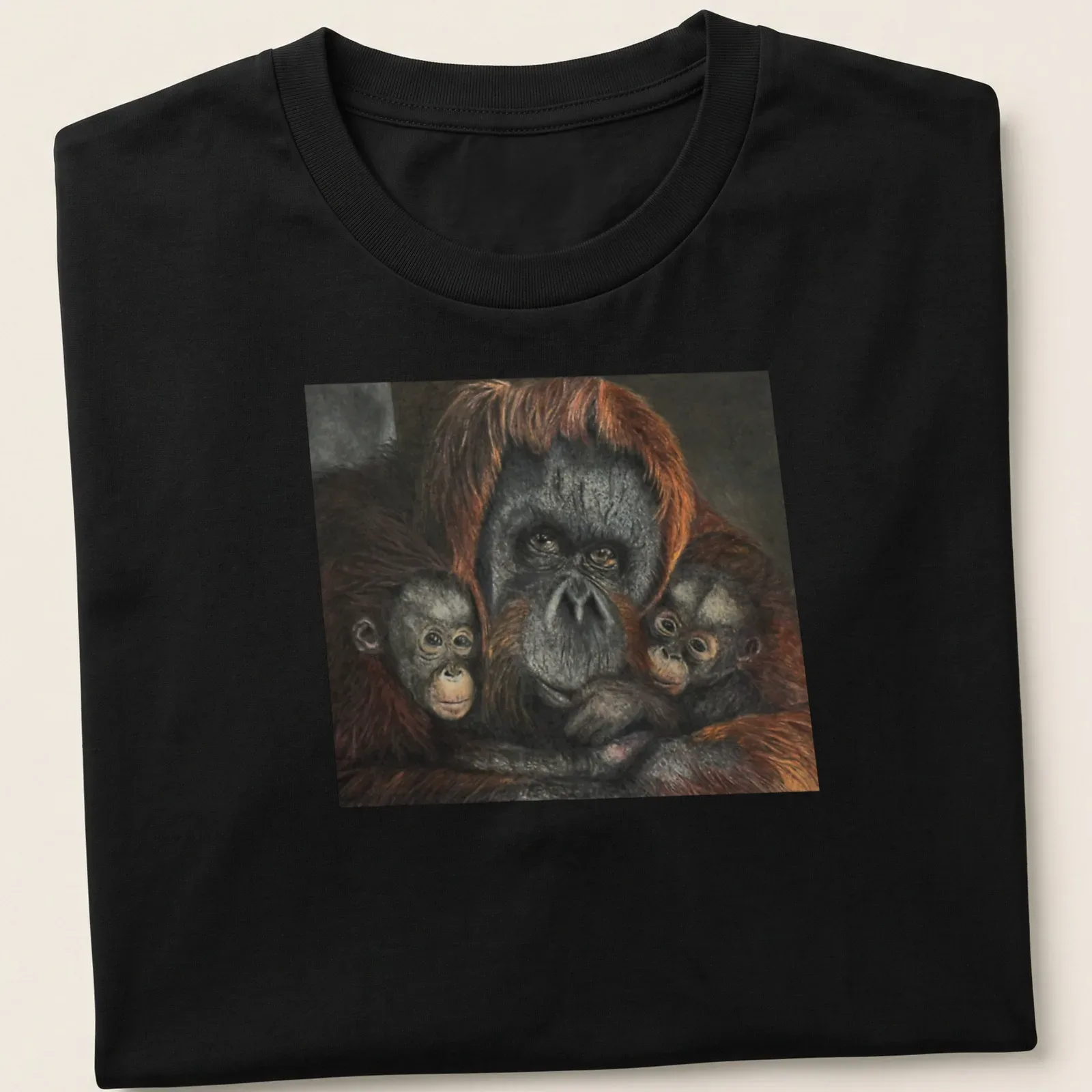 Realistic depiction of an orangutan family in rich earthy tones — printed on a unisex t-shirt